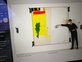 Behind the scenes. Joe Clark photographs a work of art.