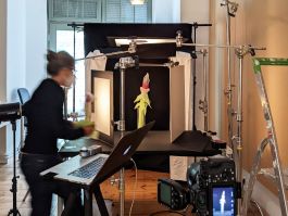 Behind the scenes. Joe Clark photographs a work of art.