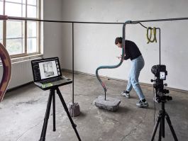 Behind the scenes. Joe Clark photographs a work of art.